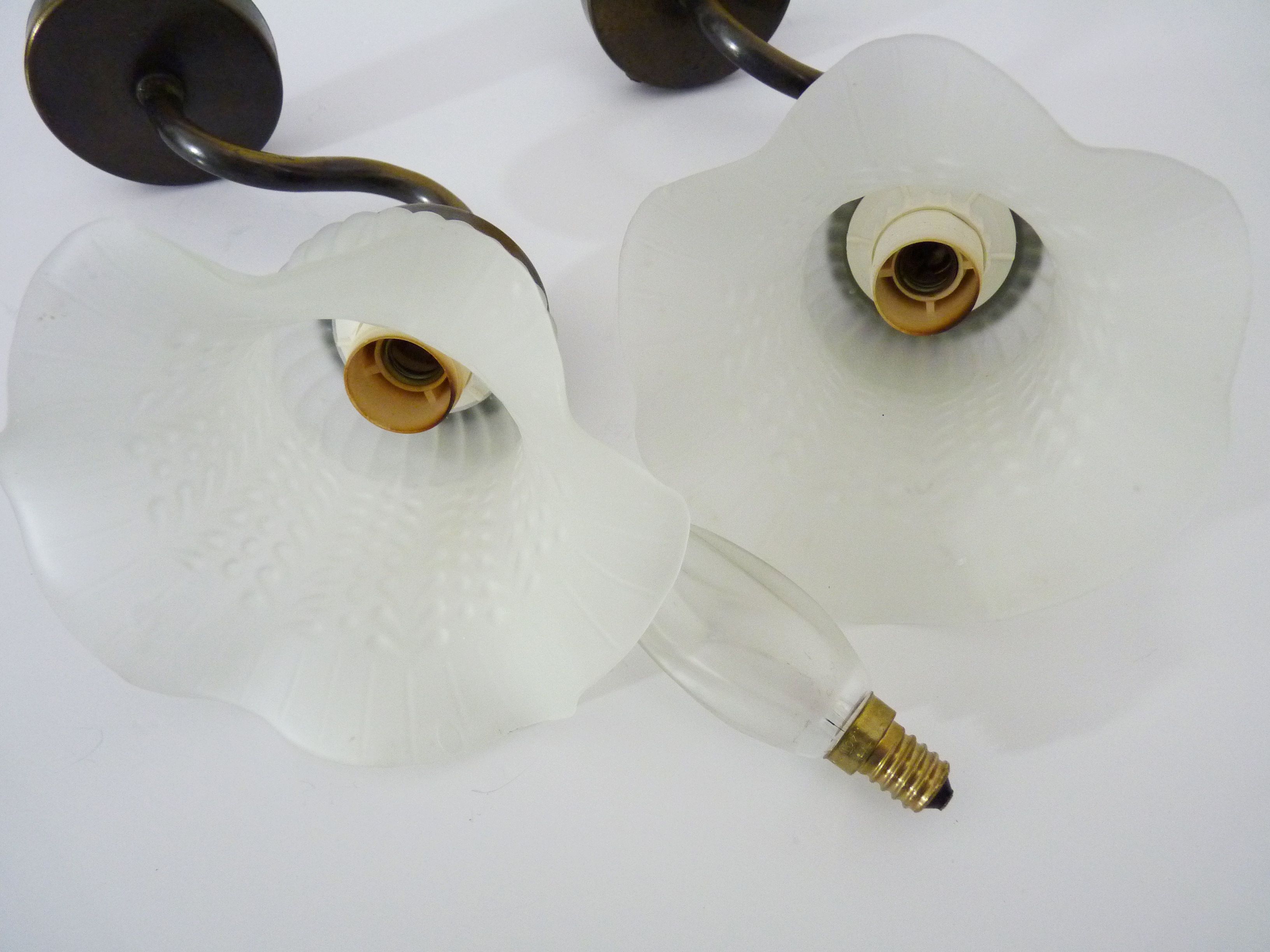 Pair of vintage brass gooseneck wall sconces and glass tulip. Year 60