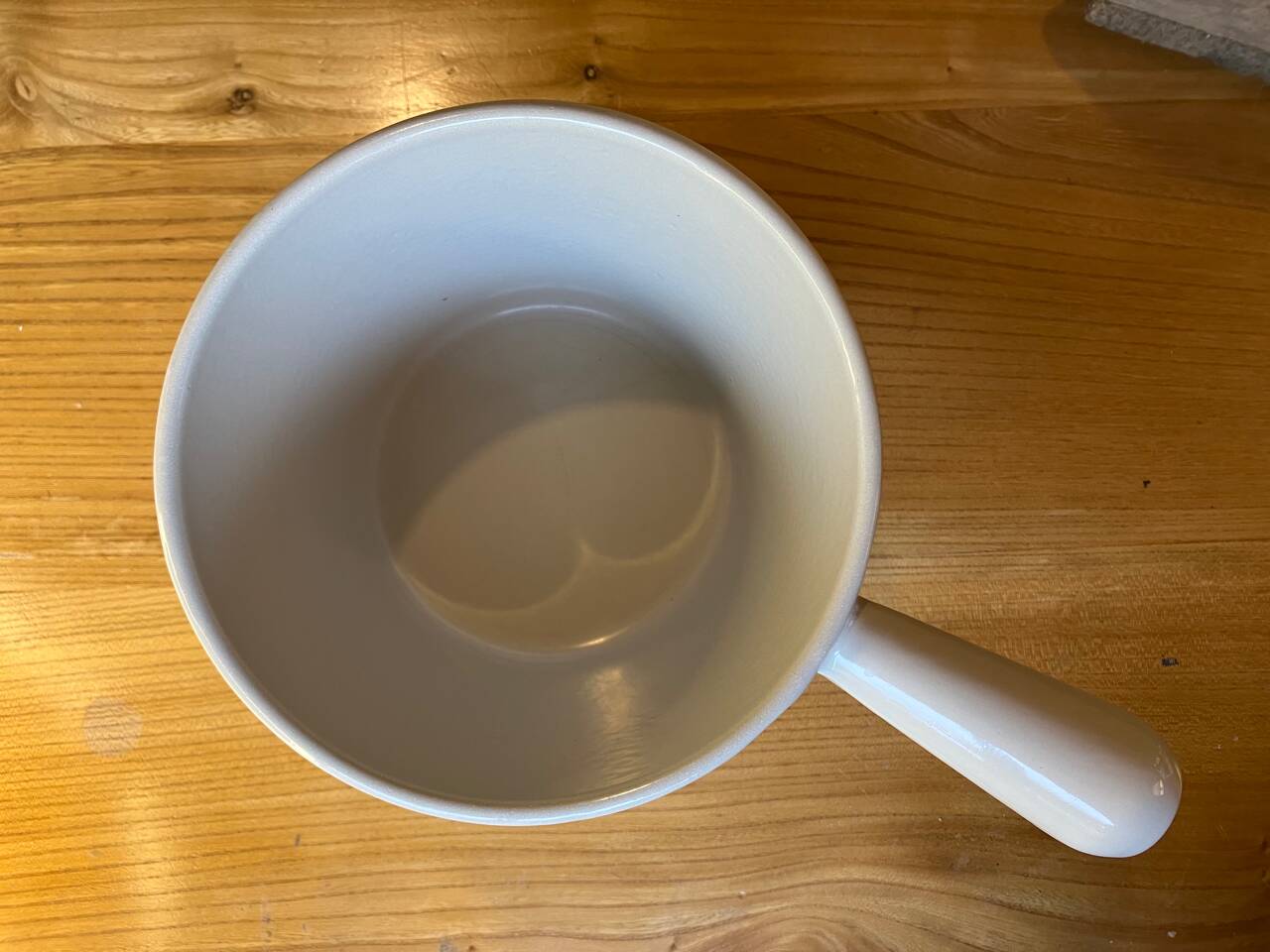 Vintage Le Creuset enameled cast iron fondue pot from the 1970s