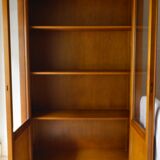 Armoire en bois naturel ouvrant  à deux portes vitrées