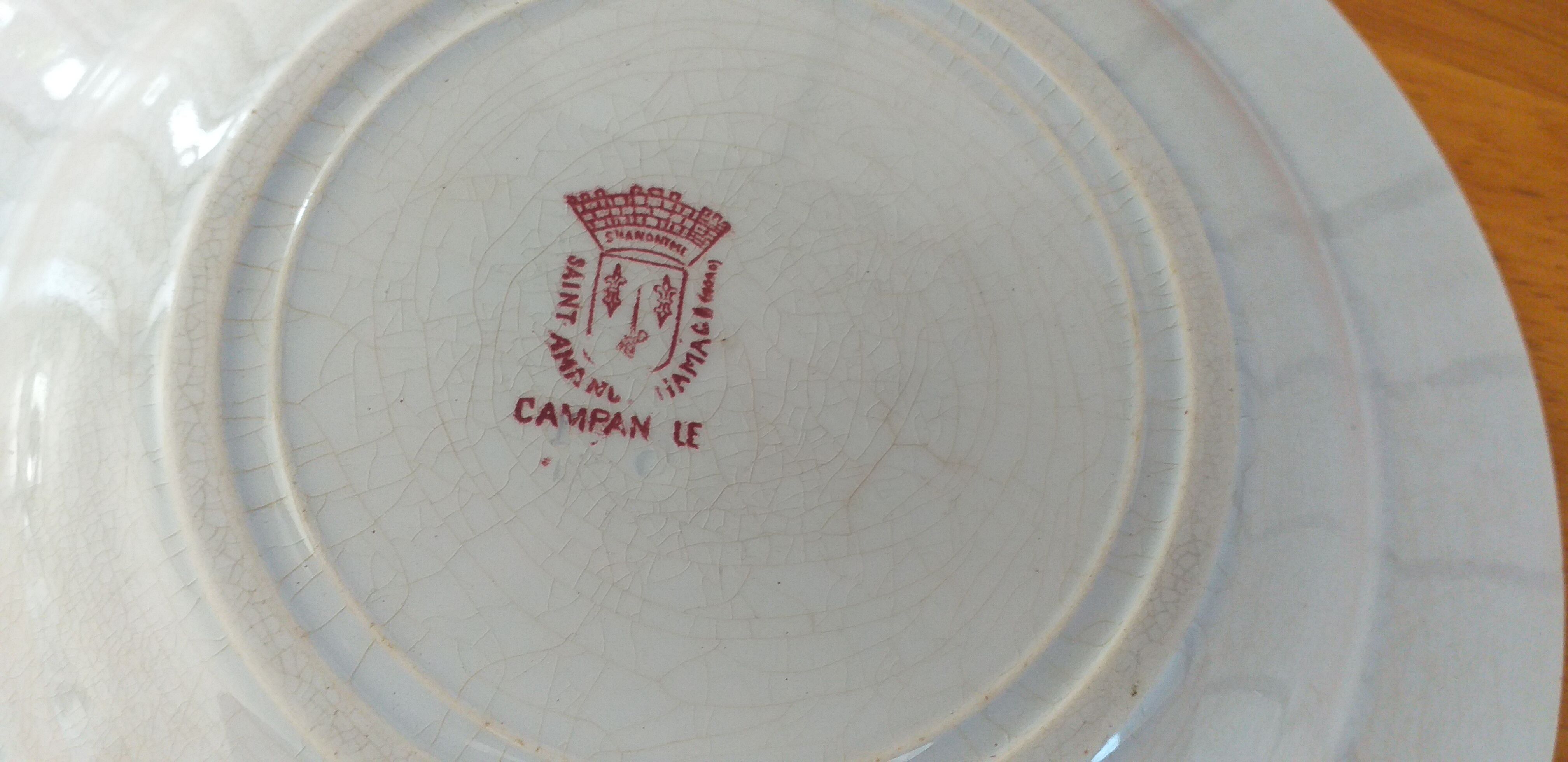 Hollow porcelain plate of St Amand and Hamage model Campanule