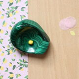 Empty brutalist pocket in malachite