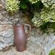 Brown stoneware jug