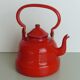 Set milk pot, kettle, coffee maker and red enamelled strainer