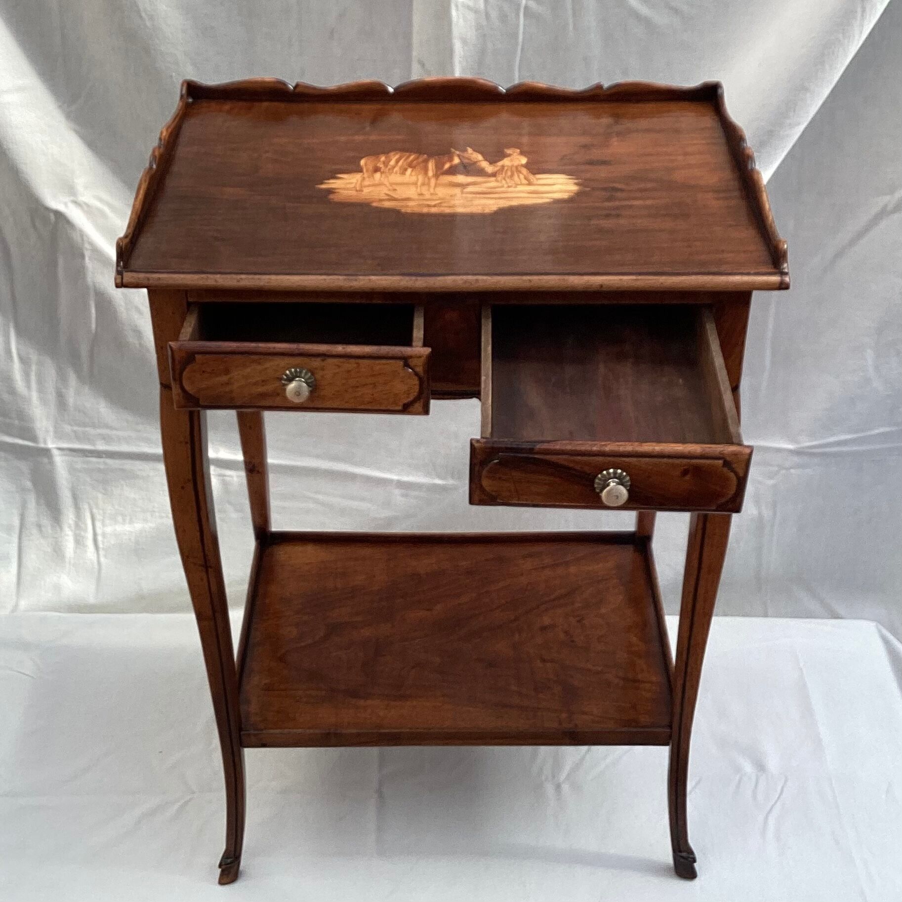 Old wooden side table with marquetry
