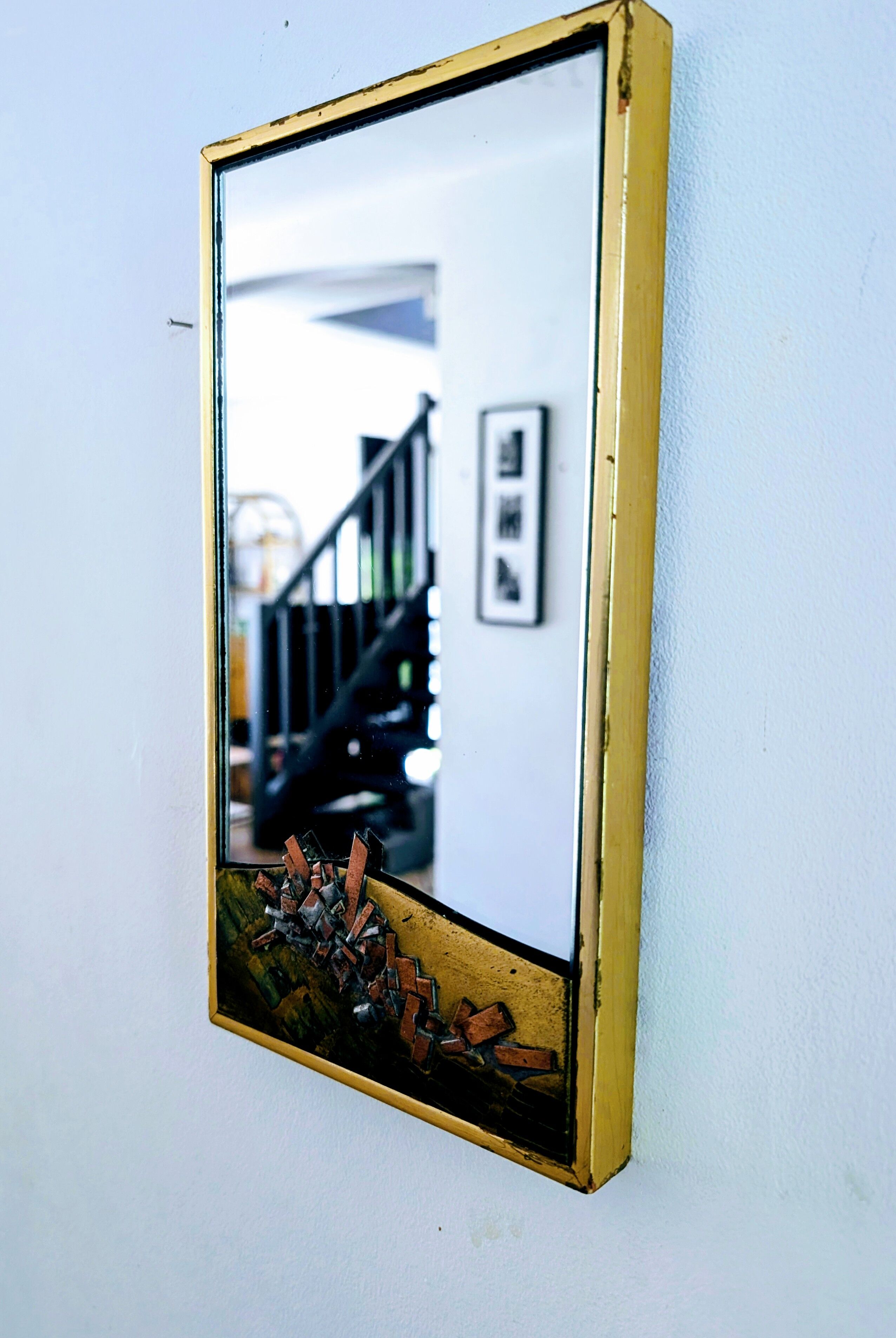 Brutalist mirror signed from the 70s.