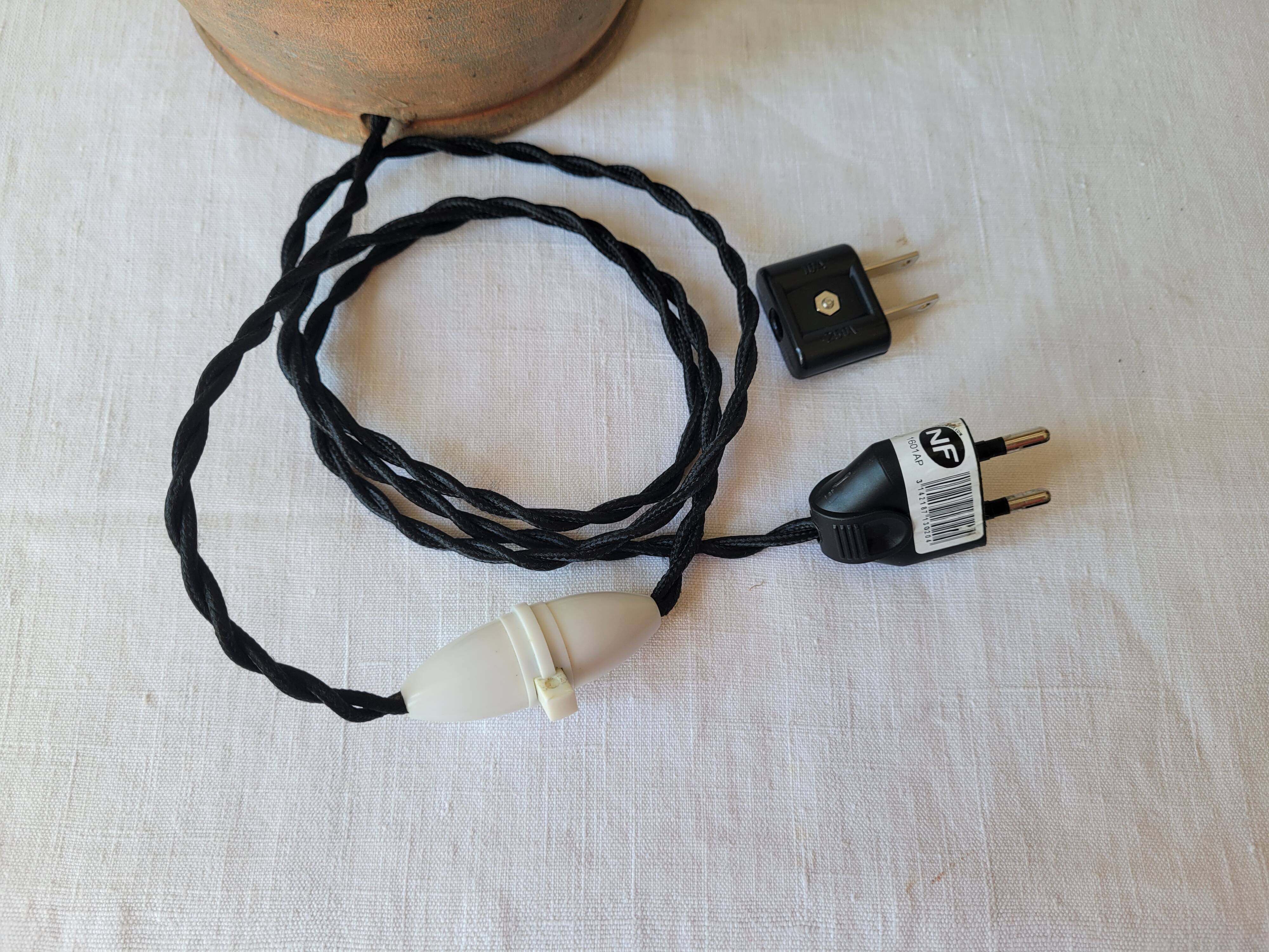 Ceramic and rattan lamp