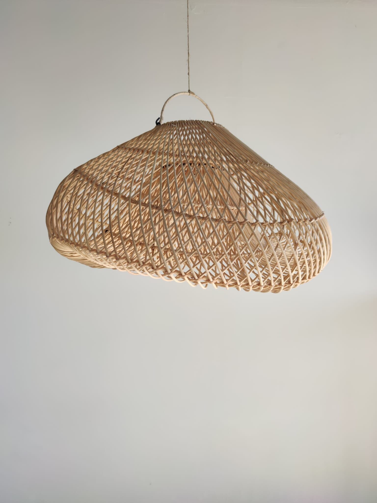 Small rattan lampshade in the shape of a braided hat