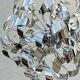 Sculptural chrome suspension design