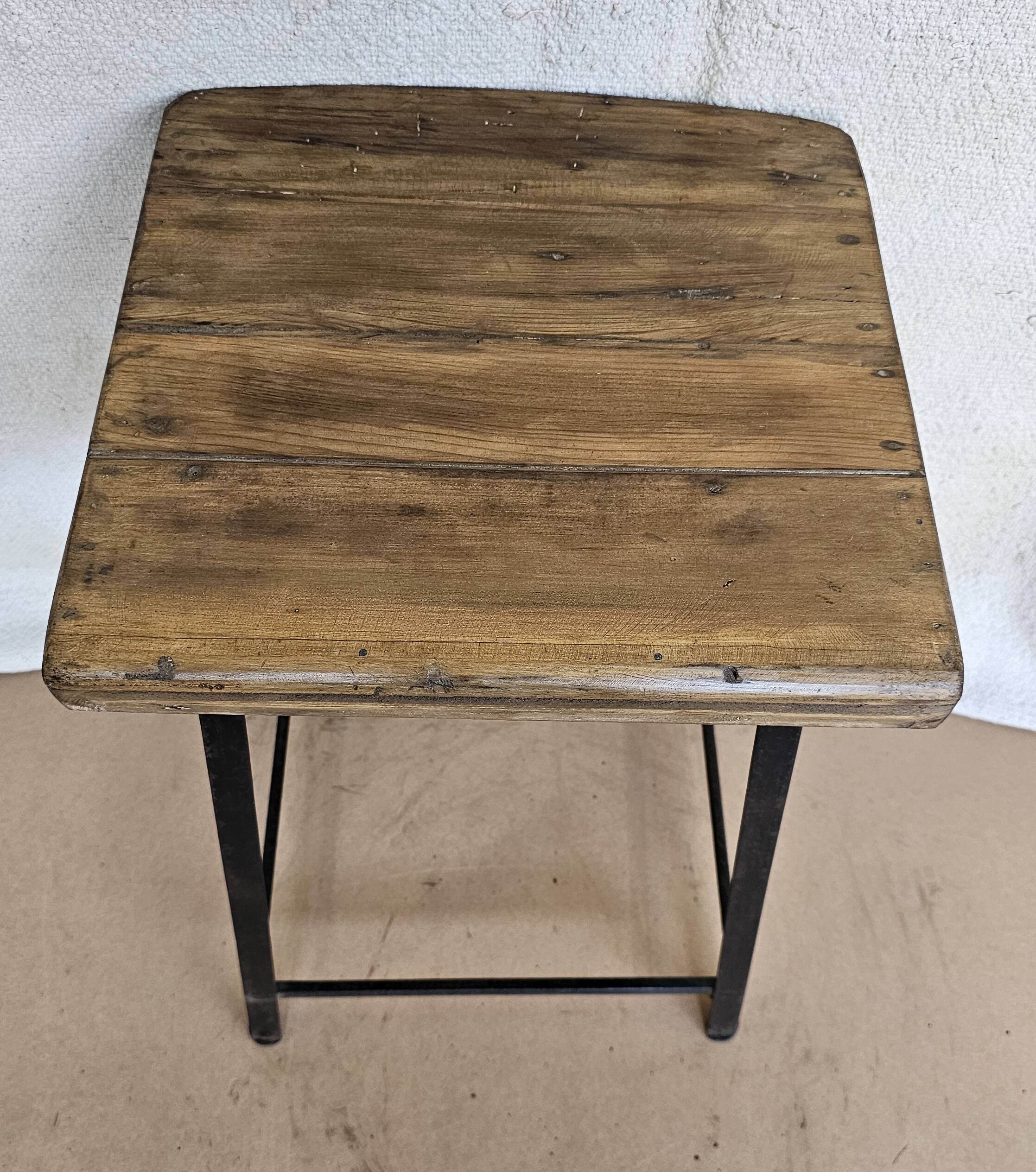 Old workshop stool in wood + wrought iron