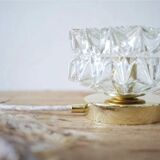 Table lamp with cut glass in the shape of a star.