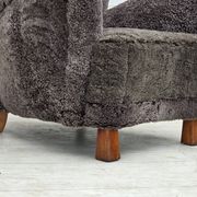 Années 1960, design danois, fauteuil rembourré, véritable peau de mouton.