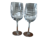 2 stemmed glasses