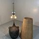 Large amphora floor lamp in pottery with a rattan shade from the 1960s.
