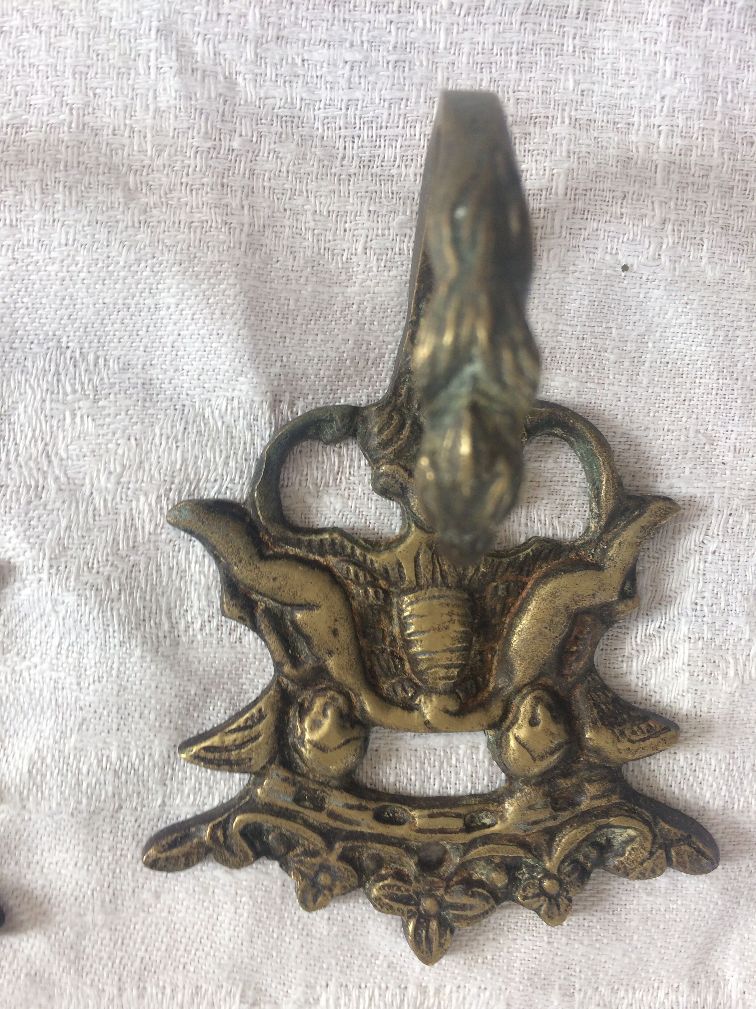 3 old hooks in bronze