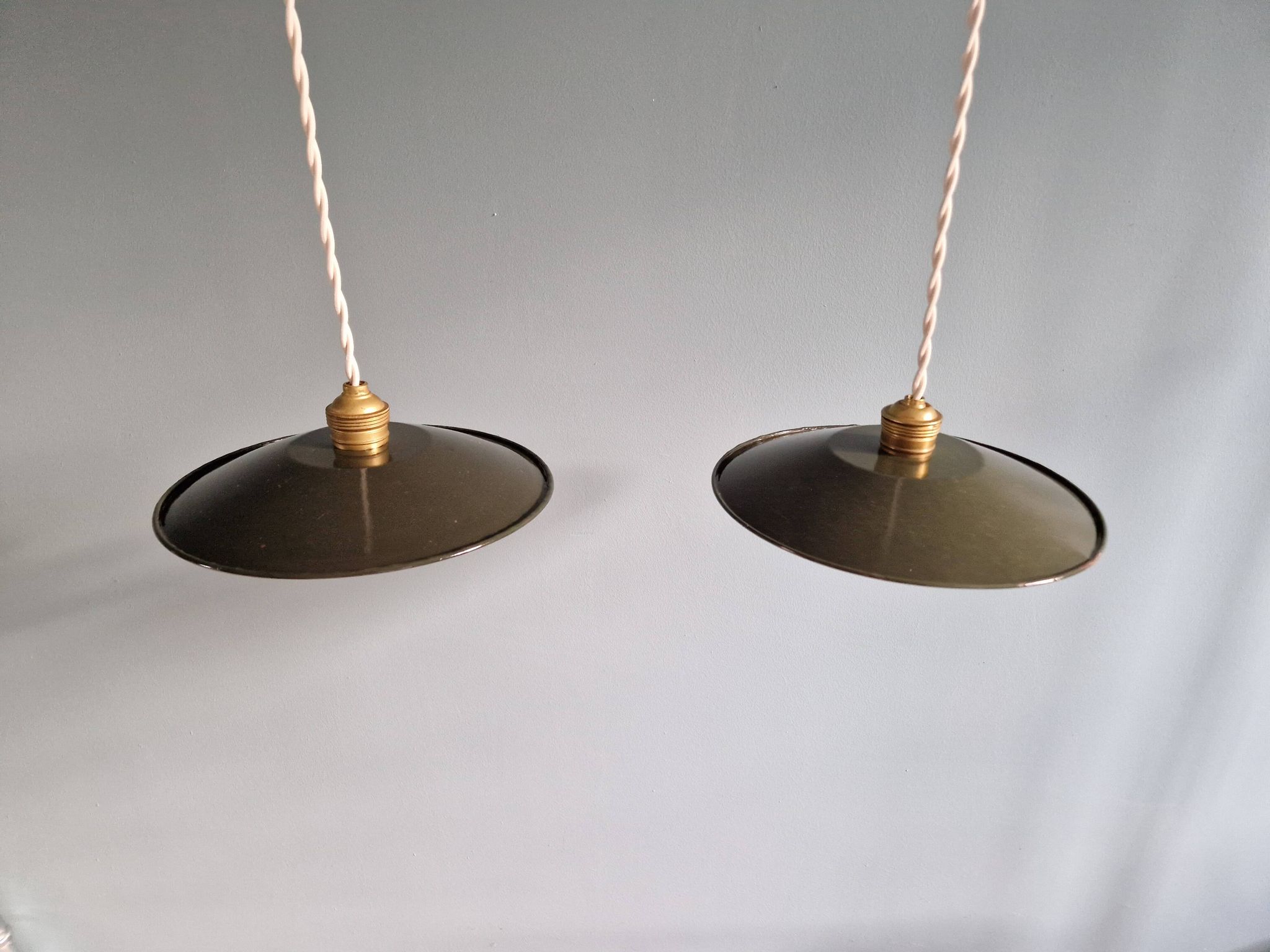 Pair of industrial pendant lights in olive green enameled sheet metal
