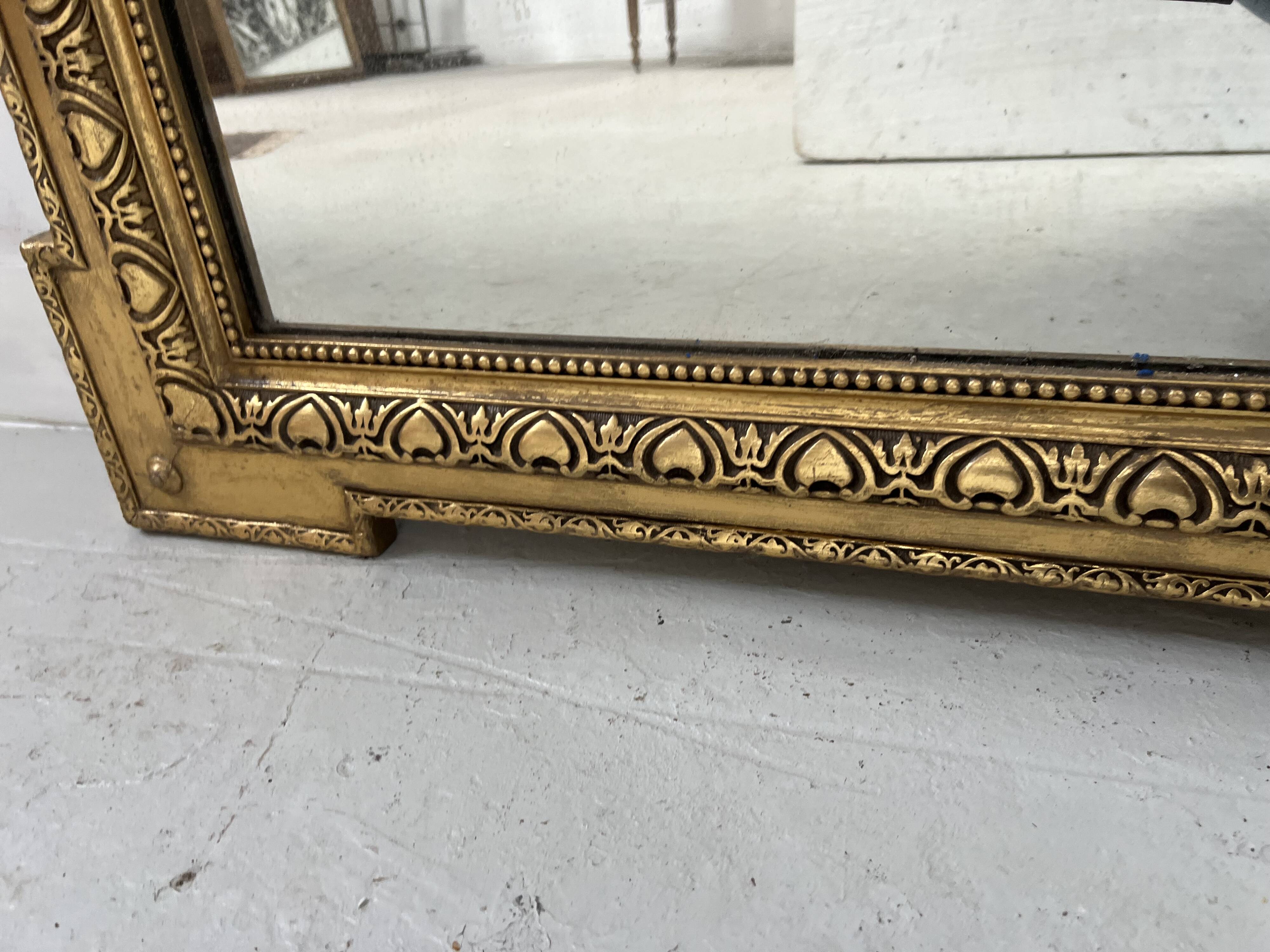 Louis XVI style mirror in wood and gilded stucco, 19th century