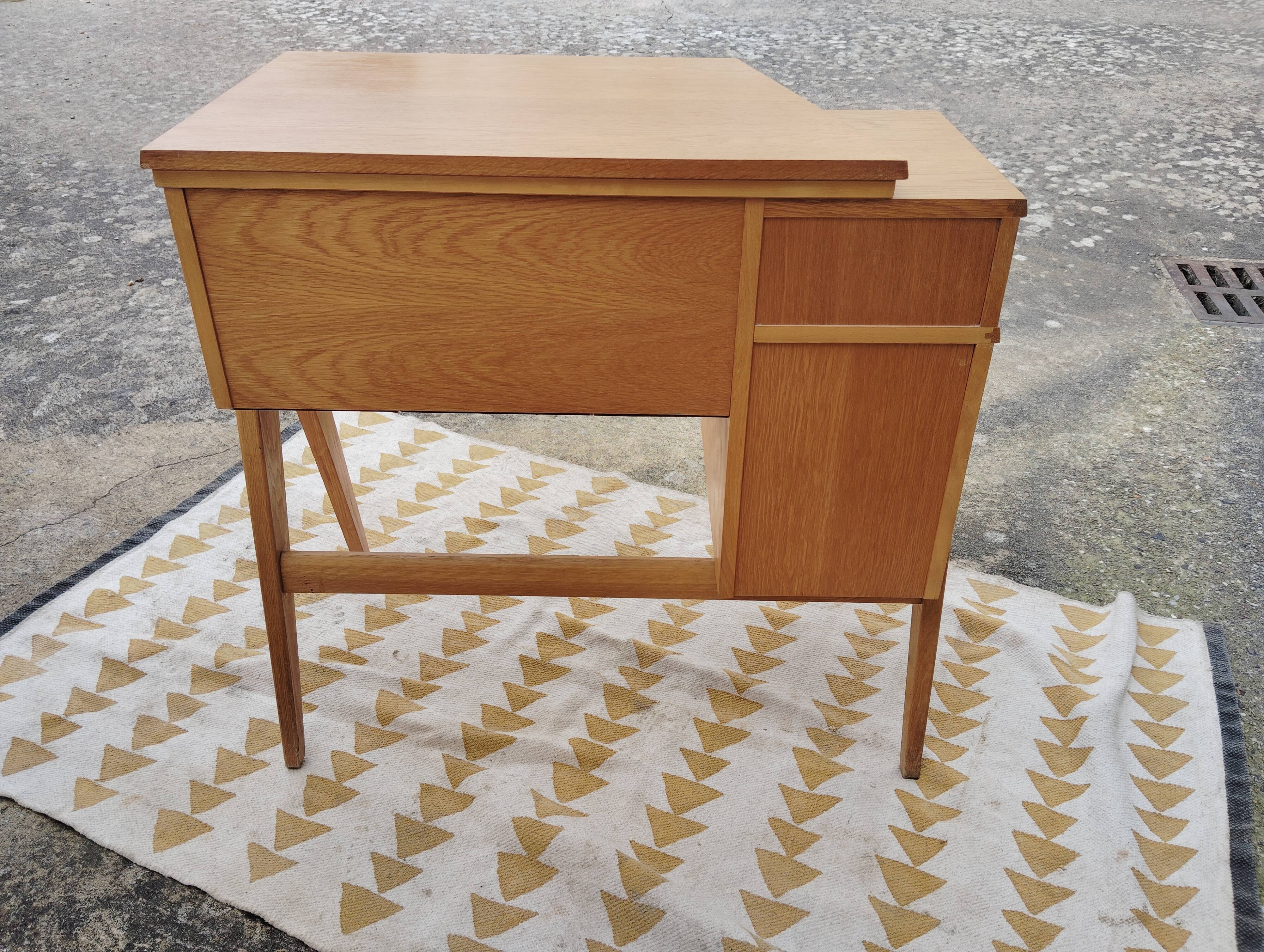 Scandinavian desk based on a Singer piece of furniture.