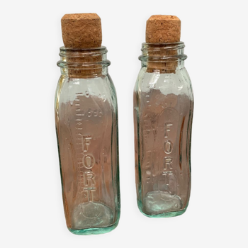 Set of two old glass baby bottles