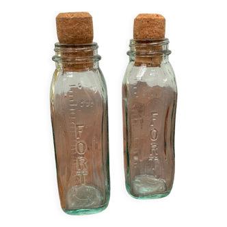 Set of two old glass baby bottles