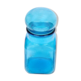Bottle of pharmacy with screw lid in blue thick glass