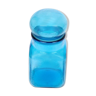 Bottle of pharmacy with screw lid in blue thick glass