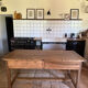 Renovated raw wood farmhouse table