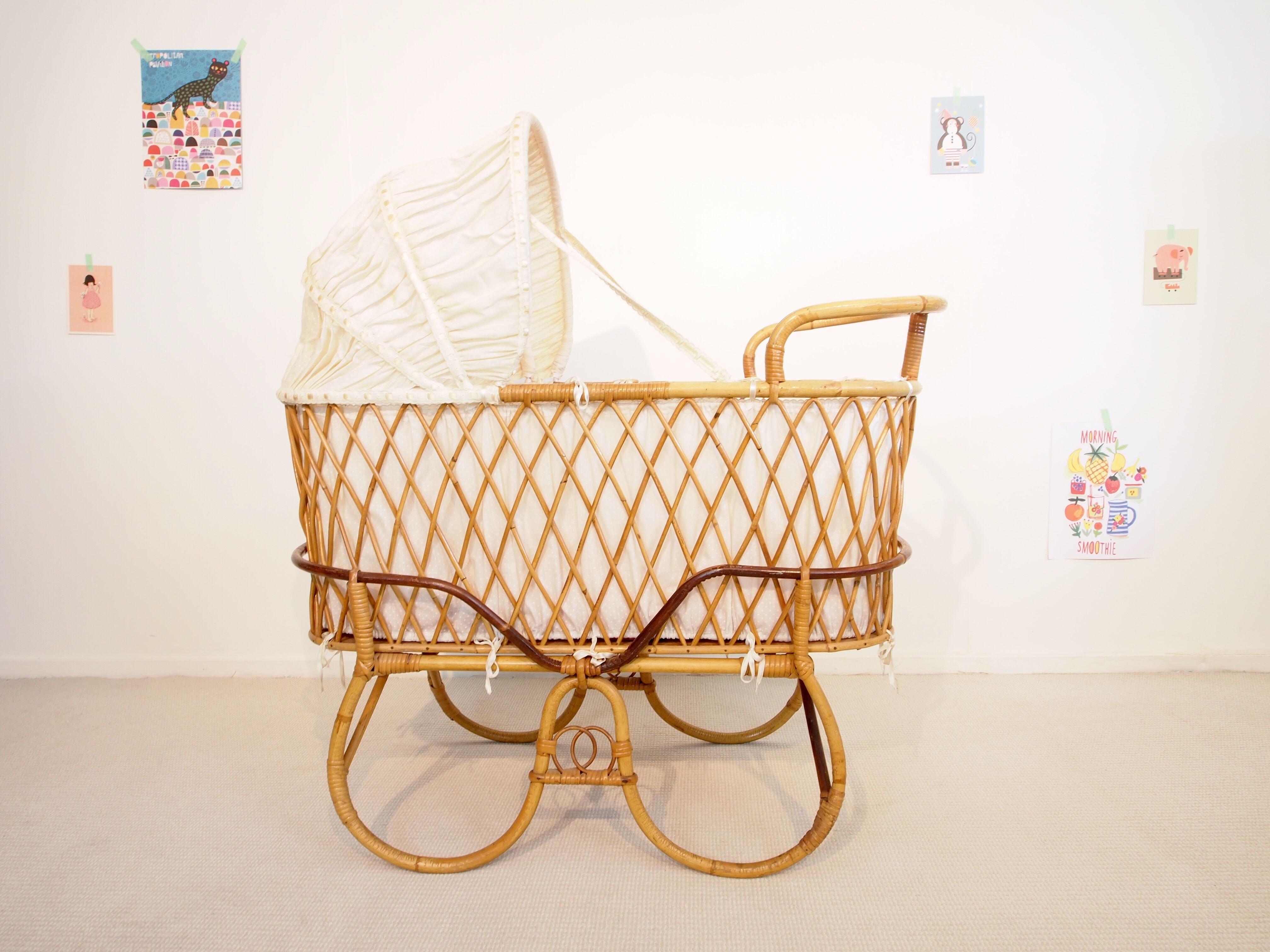 Vintage mid century rattan cradle