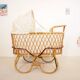 Vintage mid century rattan cradle