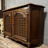 Magnificent curved woodwork buffet with double secret bottom, Louis XV style, in oak, circa 1900