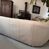 Rounded off-white leather sofa