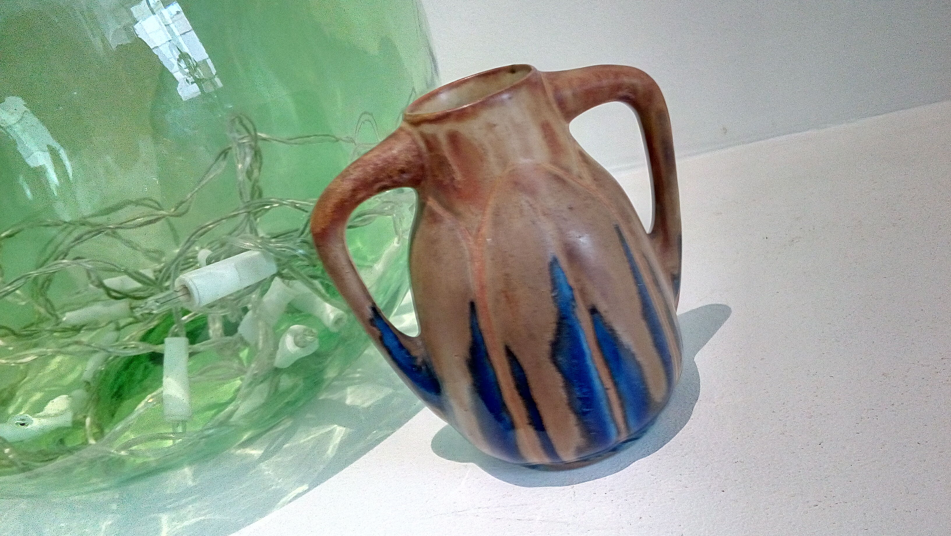 Blue enamelled flamed sandstone vase by Méténier