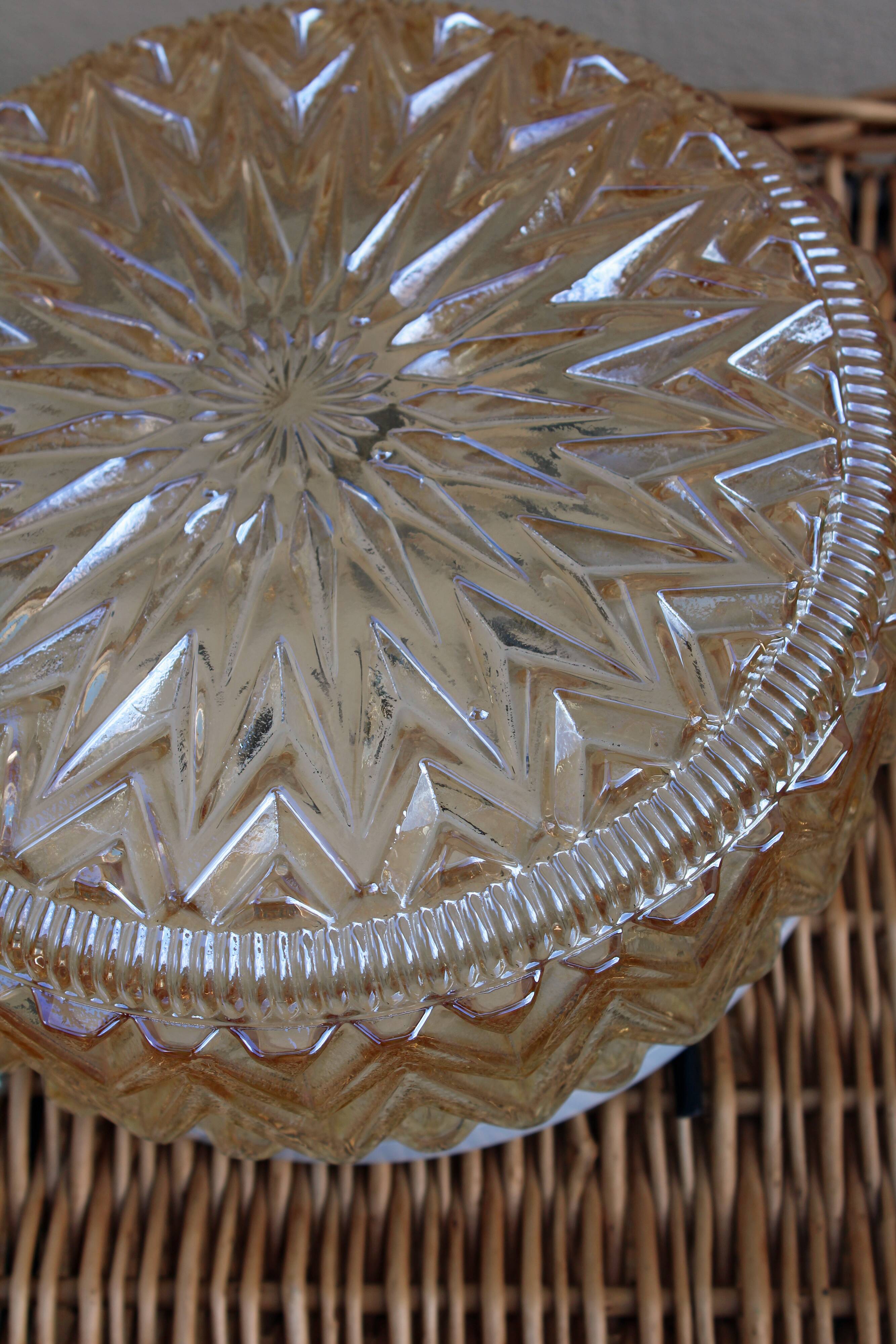 Amber moulded glass ceiling