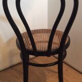 Chaise bistrot Thonet en bois noir et cannage