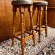 Antique English Chesterfield mahogany bar with bar stools