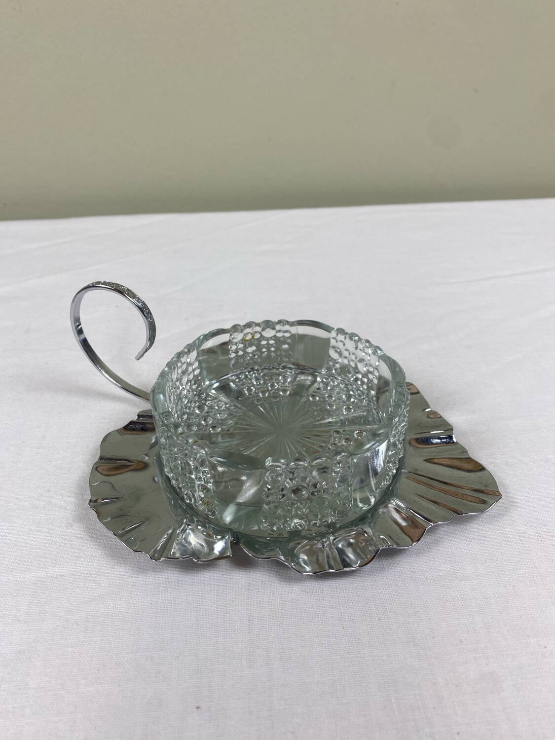 Metal and glass bowl