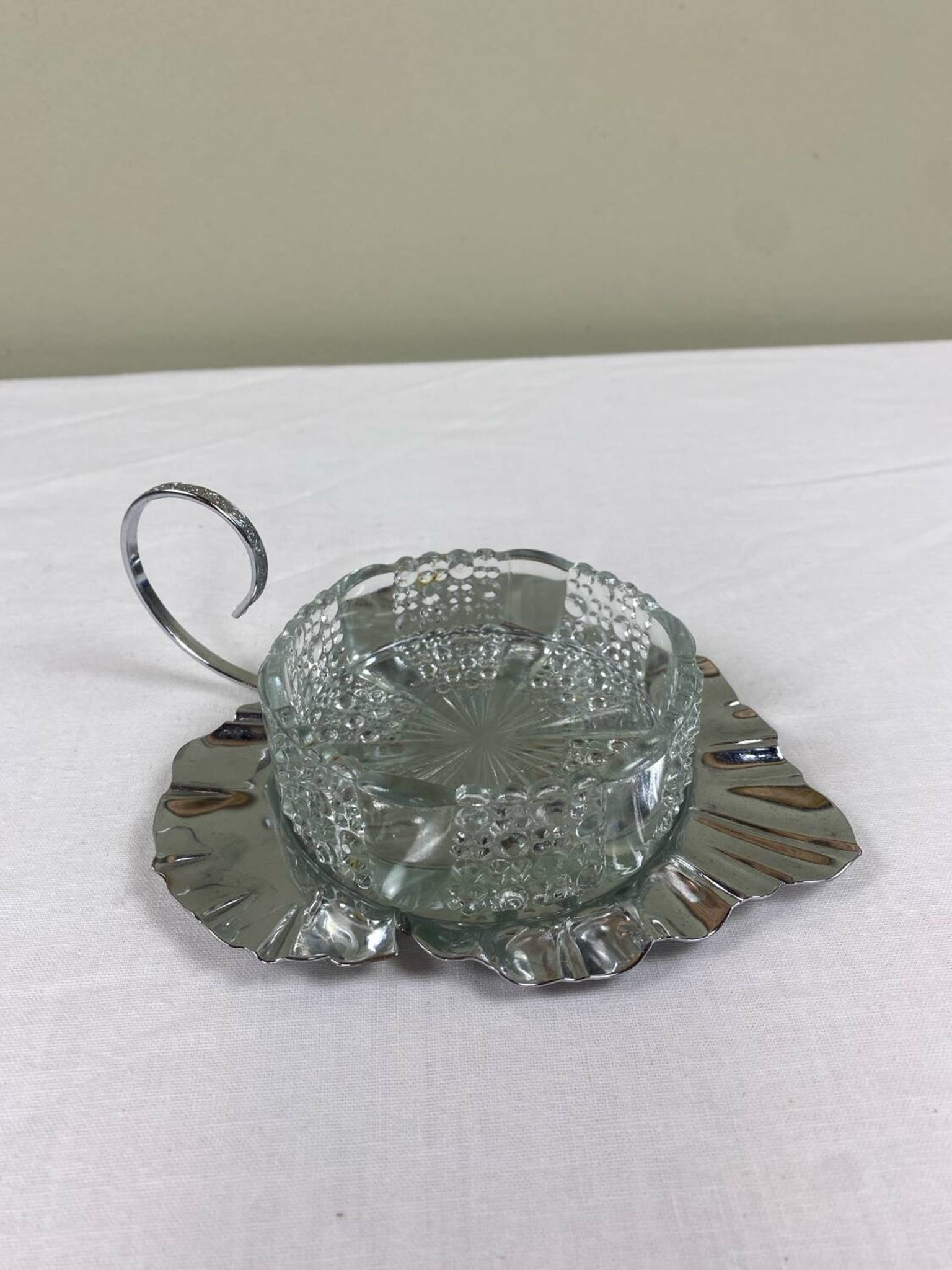 Metal and glass bowl