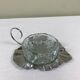 Metal and glass bowl