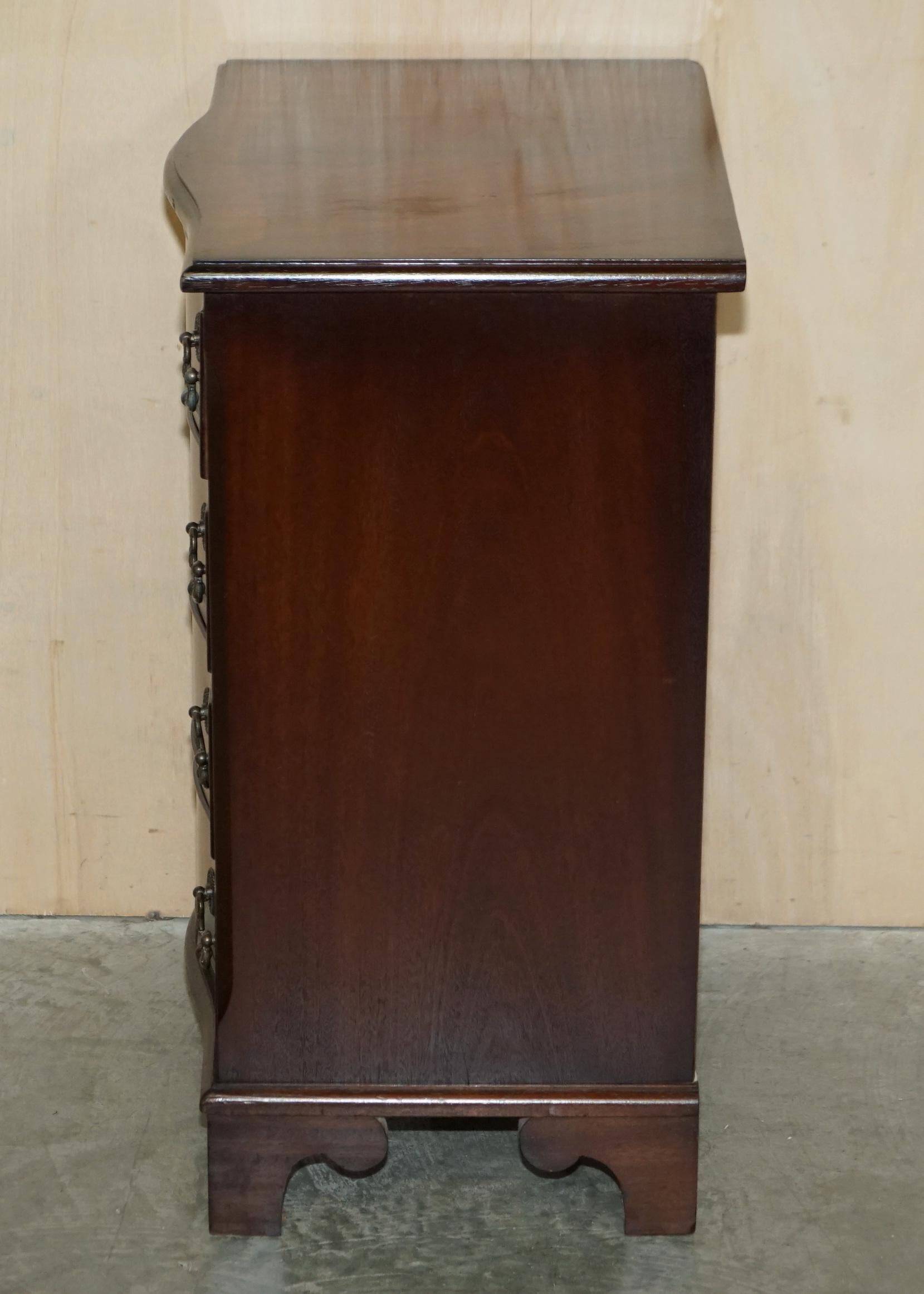 Vintage serpentine front hardwood chest of drawers