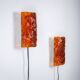 Vitrika Nybro amber coloured wall lamps