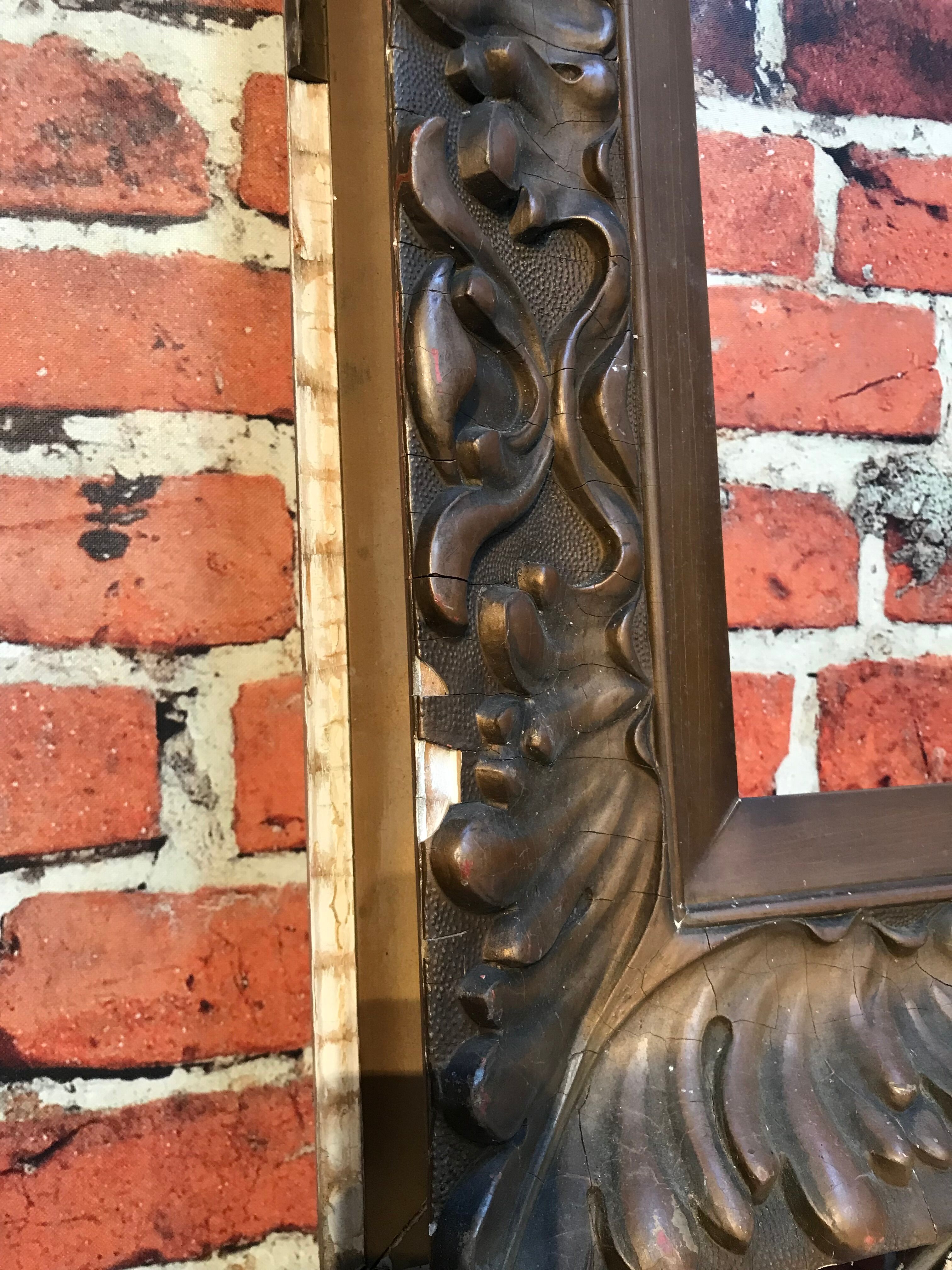 Wooden frame and stucco moldings