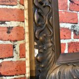 Wooden frame and stucco moldings