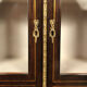 Varnished wood showcase and gold decoration in imitation of the so-called Boulle marquetry