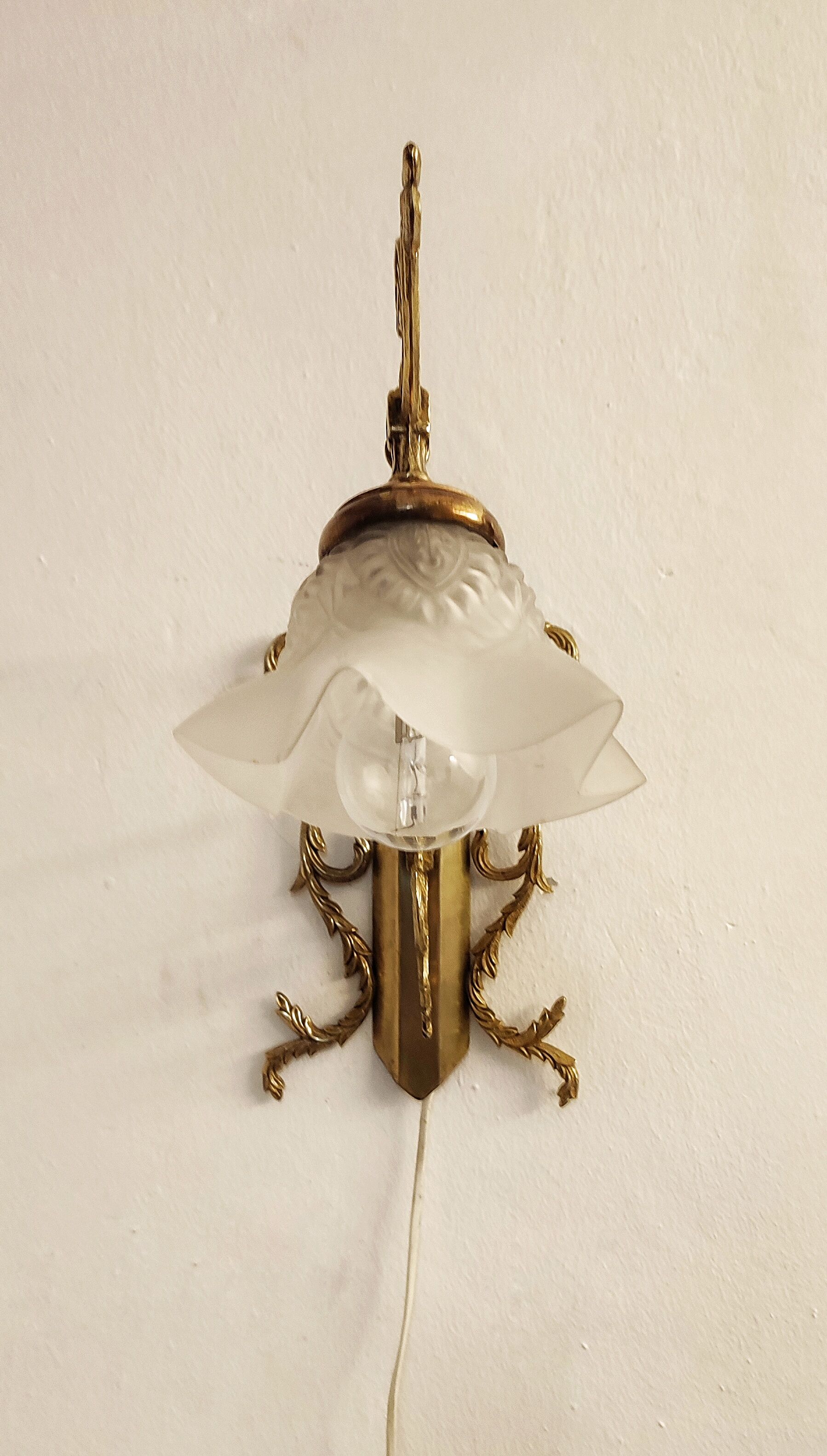 Bronze Modernist wall lamp. Spain, 1930s.