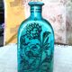 Antique Iranian three-sided blue ceramic bottle