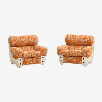 Pair of italian orange armchairs with swirl design