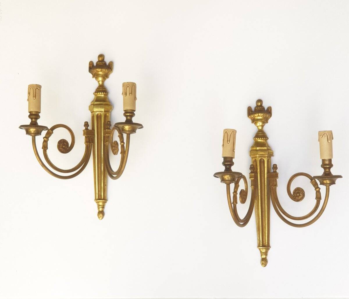 Pair of bronze wall sconces in Louis XVI style