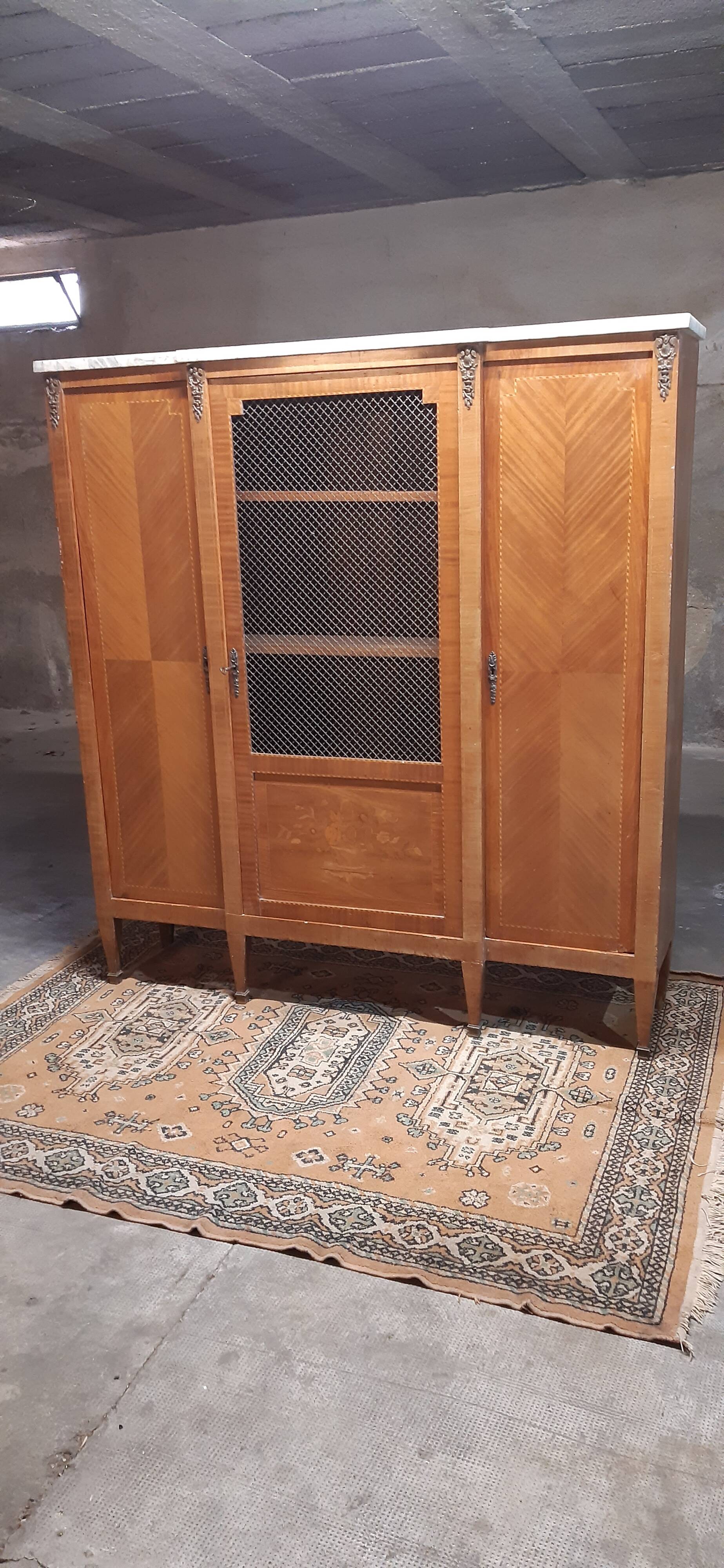 Louis XVI library with marble and precious wood marquetry circa 1850.
