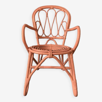 Vintage pink rattan armchair