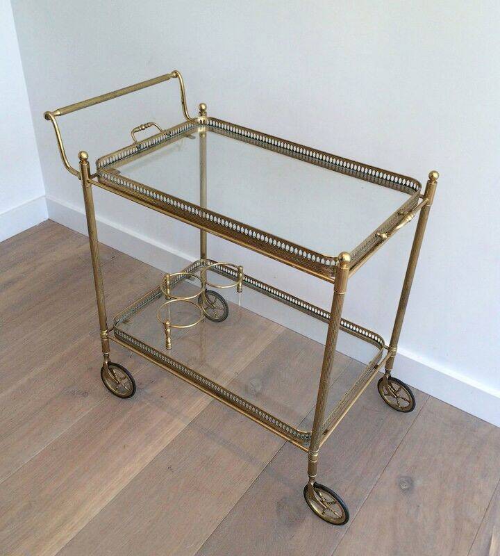 Neoclassical brass trolley with removable trays.