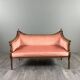 Louis XVI style canapé in carved wood and velvet, 20th century